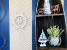 Decorative Ship Wheel with Sailboat