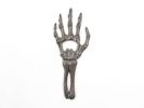Cast Iron Skeleton Hand Bottle Opener 7"