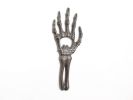 Cast Iron Skeleton Hand Bottle Opener 7"