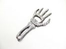 Cast Iron Skeleton Hand Bottle Opener 7"